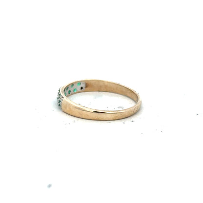 9ct yellow gold ring with diamond and emerald gemstones, size P, featuring a detailed jewelry design.