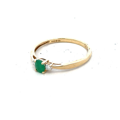 9ct yellow gold ring with diamond and emerald accents, size S, featuring elegant gemstone detailing.