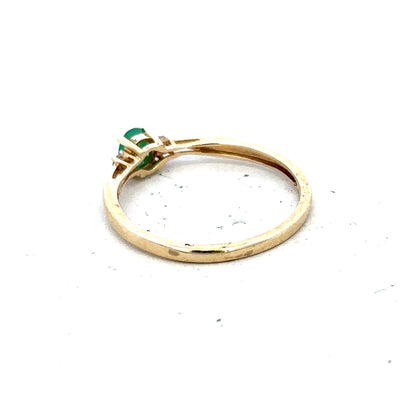 9ct yellow gold ring with diamond and emerald accents, size S, featuring intricate design and sparkling gemstones.