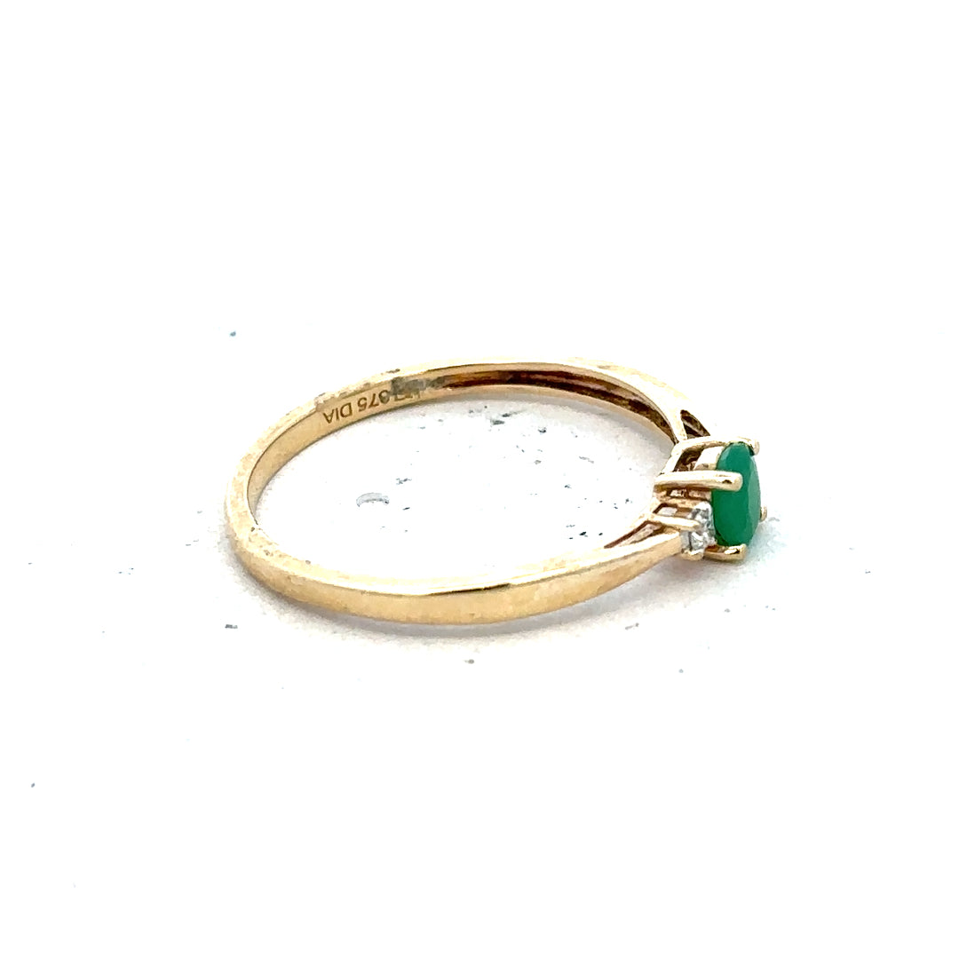 9ct yellow gold ring with diamond and emerald gemstones, size S, featuring a detailed design and polished finish.