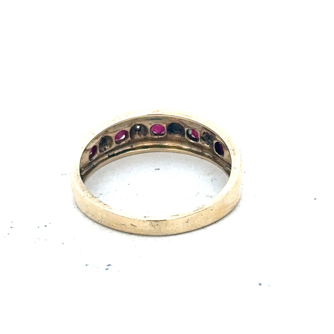 9ct yellow gold diamond and ruby ring, size M, with intricate design and 2.3g weight, unbranded jewelry.