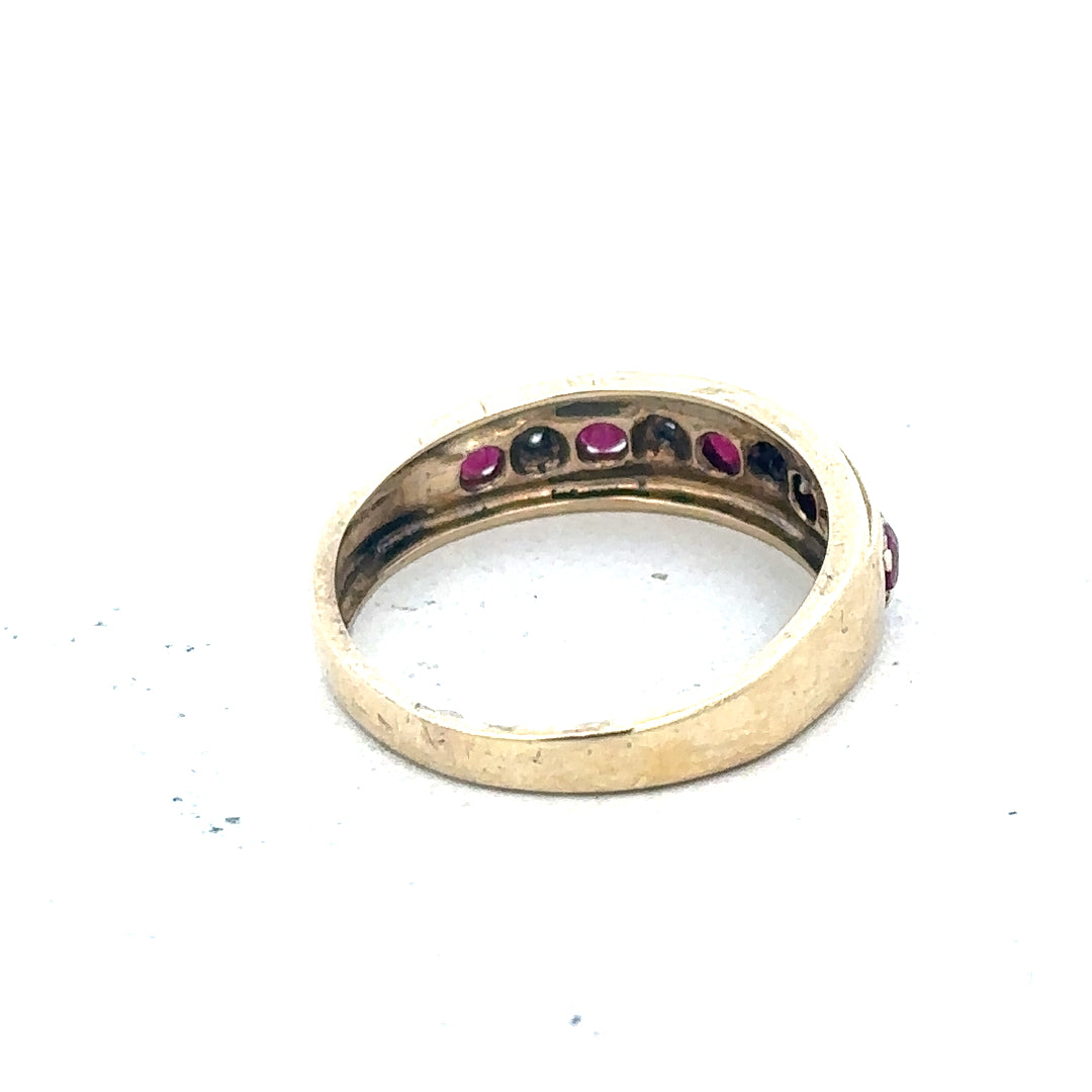 9ct yellow gold diamond and ruby ring, size M, showcasing a detailed gemstone design and elegant craftsmanship.