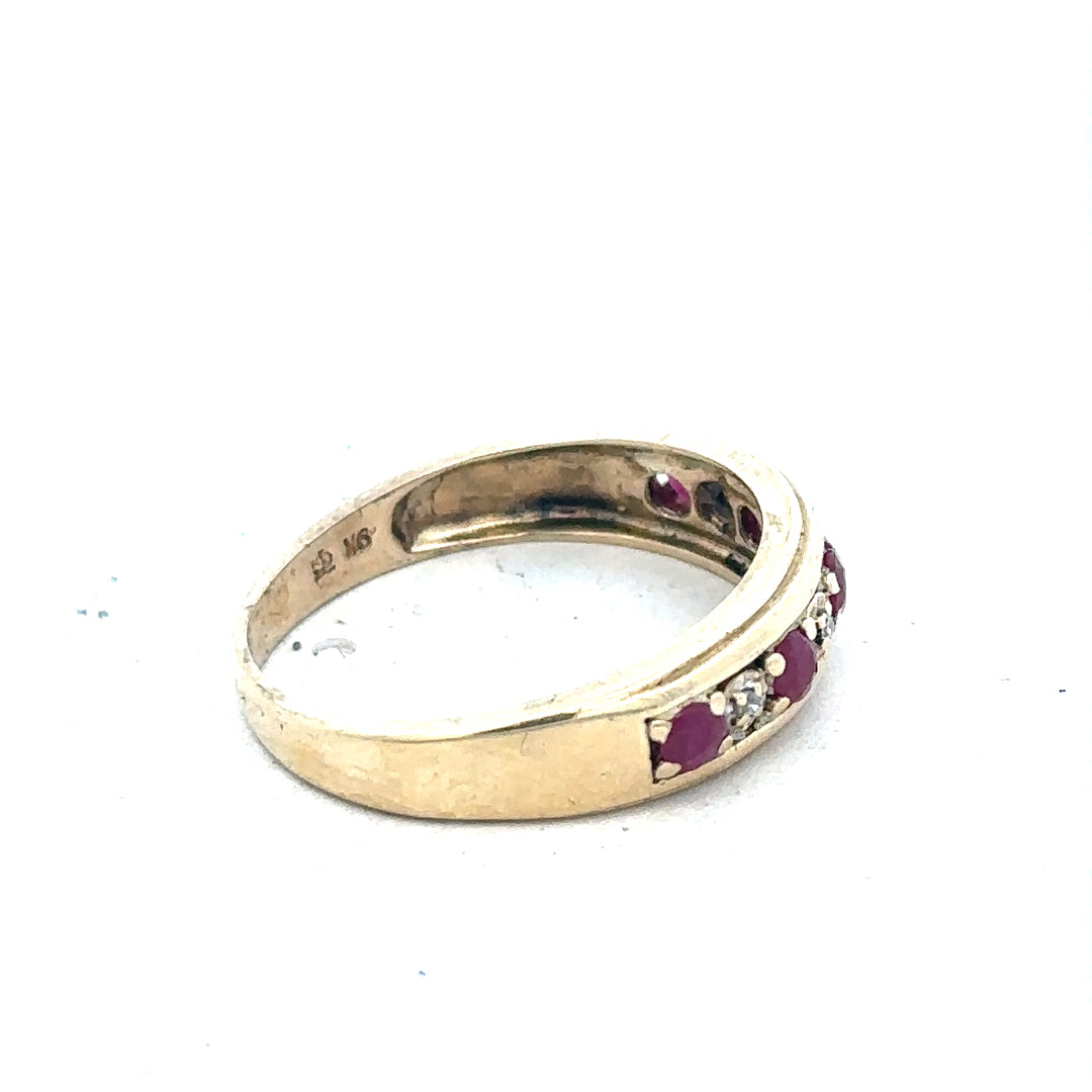 9ct yellow gold ring with diamonds and rubies, size M, featuring a detailed gemstone design and 2.3g weight.