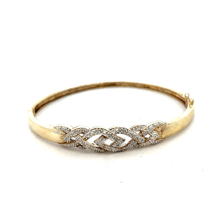 9ct yellow gold diamond bangle with intricate design, weighs 10 grams, showcasing sparkling diamonds on a high-quality jewelry piece.
