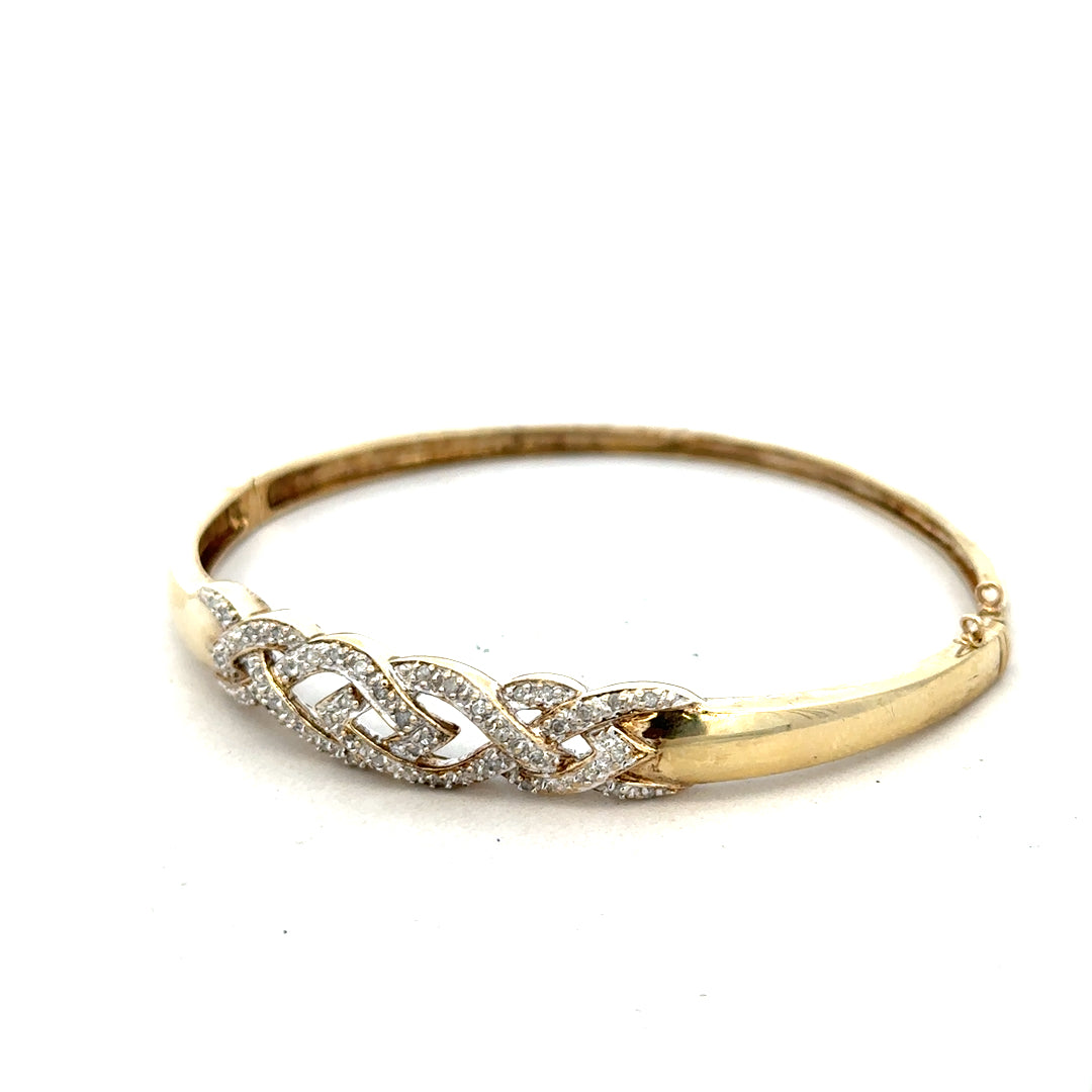 9ct yellow gold diamond bangle with sparkling diamonds, weighs 10g, crafted in unbranded design, elegant jewelry accessory.