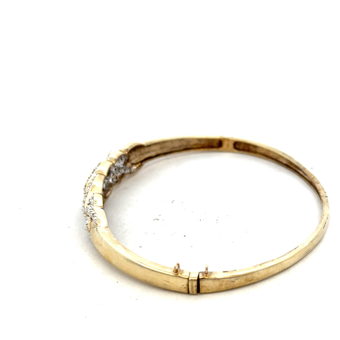 9ct yellow gold diamond bangle with embedded diamonds, elegant jewelry piece weighing 10g, unbranded.