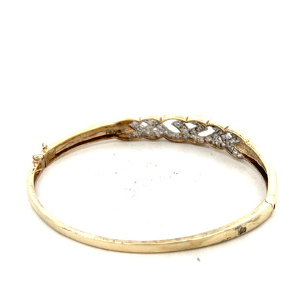 9ct yellow gold diamond bangle with sparkling diamonds, unbranded, showcasing a sleek and elegant jewelry design.