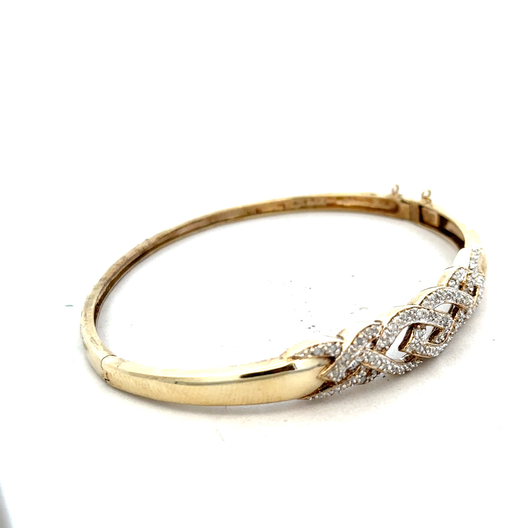 9ct yellow gold diamond bangle with sparkling diamonds, unbranded, weighing 10g, stylish and elegant jewelry accessory.