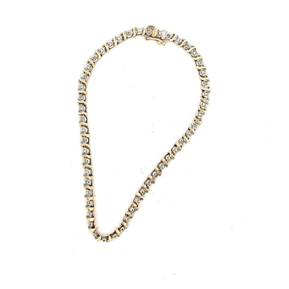 9ct yellow gold diamond bracelet weighing 5g, featuring sparkling diamonds and a delicate chain design.
