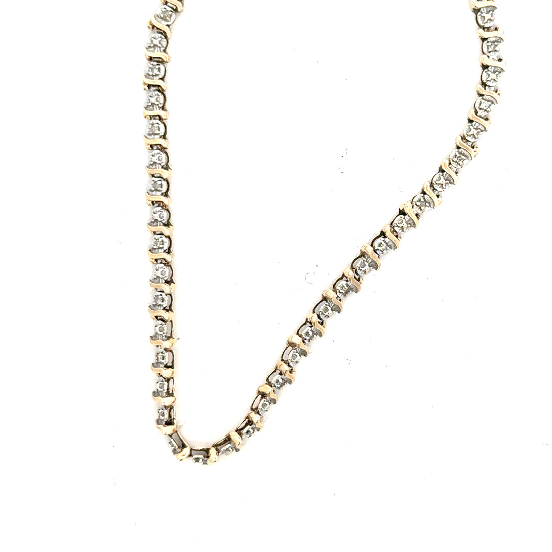 9ct yellow gold diamond bracelet weighing 5g with sparkling diamonds, displayed on a neutral background.