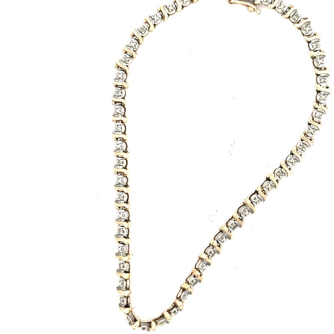 9ct yellow gold diamond bracelet weighing 5g, featuring sparkling diamonds and a delicate chain design.