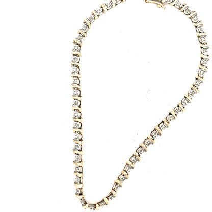 9ct yellow gold diamond bracelet weighing 5g, featuring sparkling diamonds and a delicate chain design.
