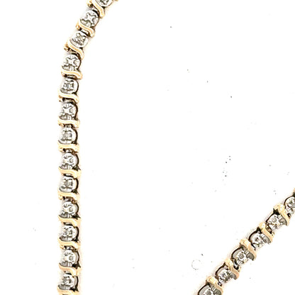 9ct yellow gold diamond bracelet with a 5g weight, featuring sparkling diamonds and a sleek design, unbranded jewelry accessory.