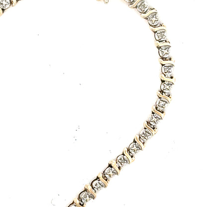 9ct yellow gold diamond bracelet weighing 5g, featuring sparkling diamonds and elegant design, unbranded jewelry accessory.