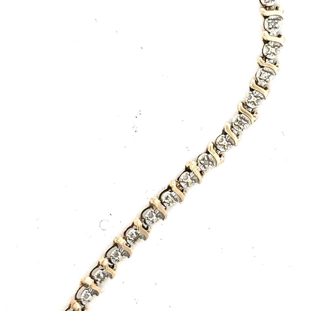 9ct yellow gold diamond bracelet weighing 5g, featuring sparkling diamonds and a delicate design, unbranded jewelry accessory.