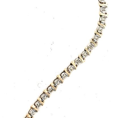 9ct yellow gold diamond bracelet weighing 5g, featuring sparkling diamonds and a delicate design, unbranded jewelry accessory.