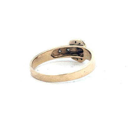 9ct yellow gold diamond buckle ring in size R with sparkling diamonds, featuring a stylish design.