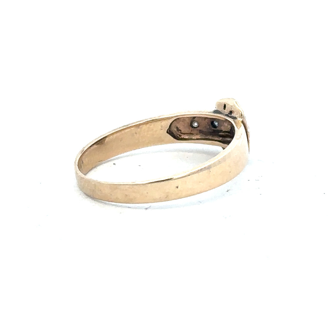 9ct yellow gold diamond buckle ring in size R with sparkling diamonds, elegant jewelry accessory.