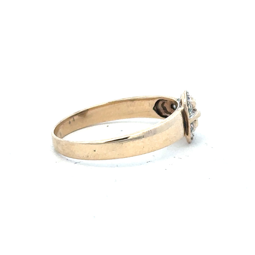 9ct yellow gold diamond buckle ring in size R, featuring a sparkling diamond accent and elegant design.