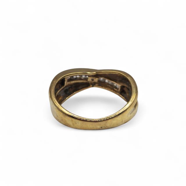 9ct yellow gold diamond crossover ring with sparkling diamonds, showcasing an elegant design and fine craftsmanship.