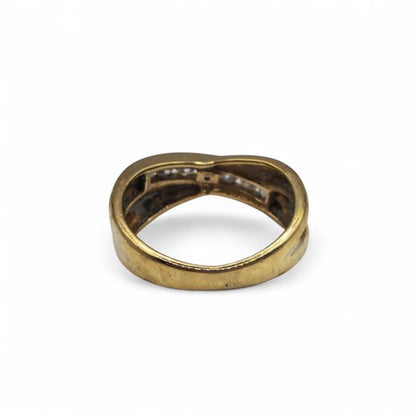 9ct yellow gold diamond crossover ring with sparkling diamonds, showcasing an elegant design and fine craftsmanship.
