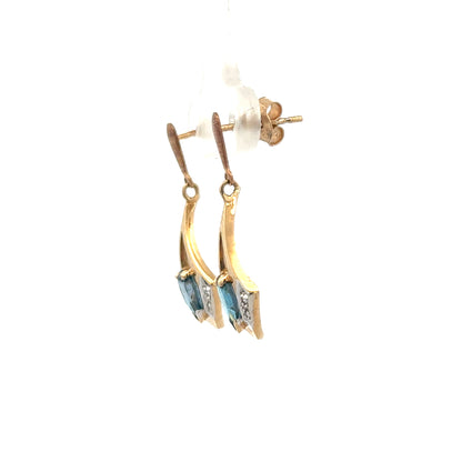 9ct yellow gold diamond earrings with sparkling stones, weighing 1.6g, featuring classic elegant design.