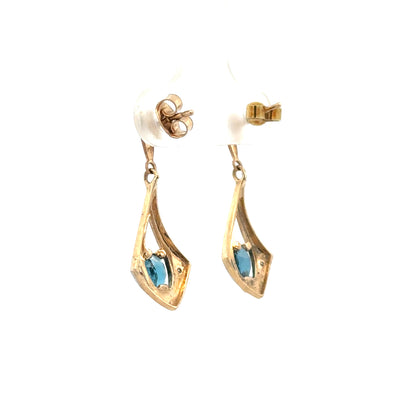 9ct yellow gold diamond earrings with sparkling stones, weighing 1.6g, featuring classic elegant design.