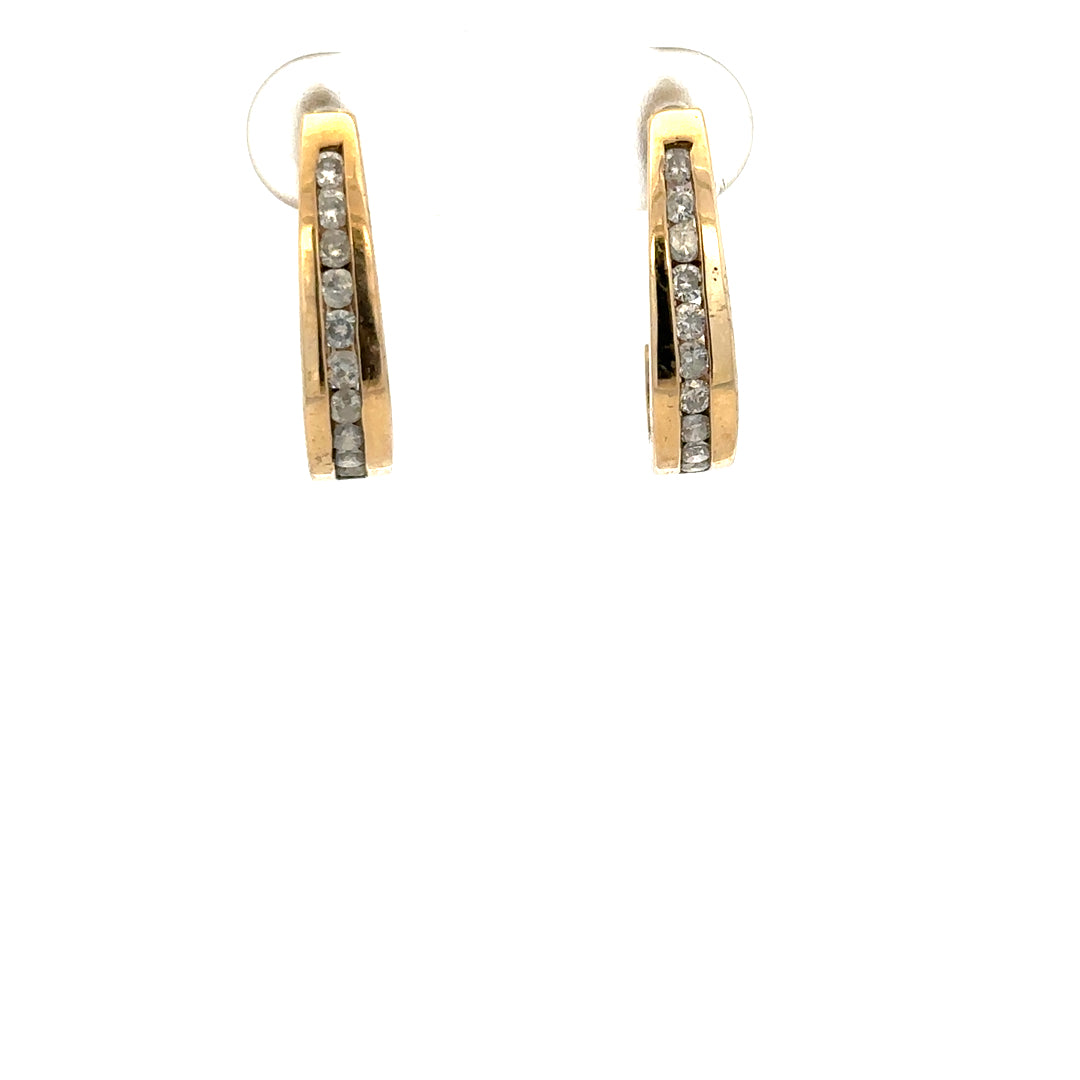 9ct yellow gold diamond earrings with sparkling stones and elegant design, weighing 3.1 grams.