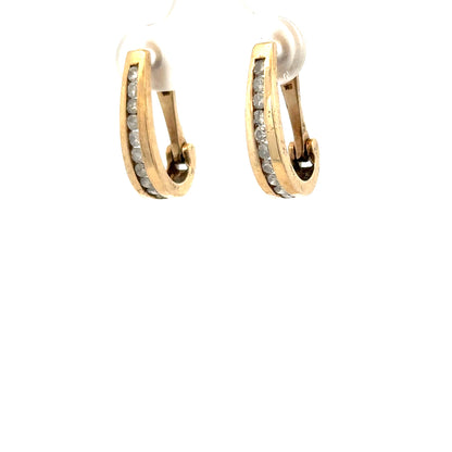 9ct yellow gold diamond earrings with sparkling diamonds, weighing 3.1g, featuring elegant design and unbranded craftsmanship.