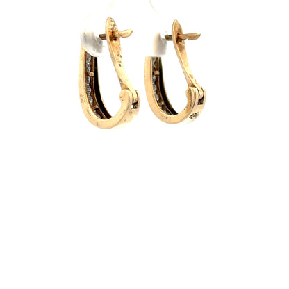 9ct yellow gold diamond earrings with sparkling stones, weighing 3.1g, featuring a classic and elegant design.