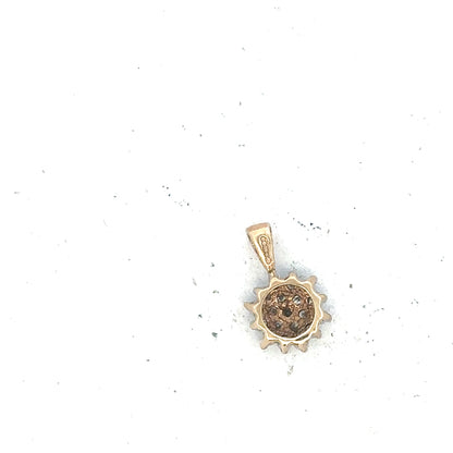 9ct yellow gold diamond pendant, delicate jewelry piece with sparkling diamonds, weighs 0.6g, unbranded.