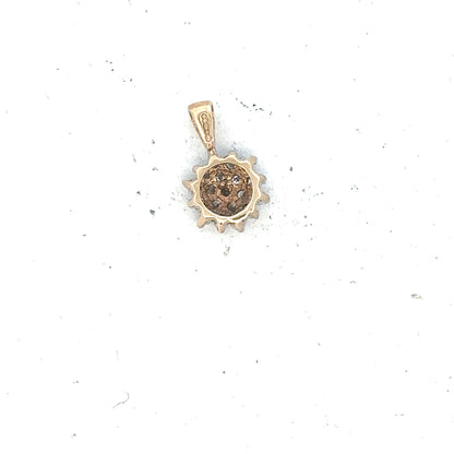 9ct yellow gold diamond pendant with delicate design, weighing 0.6g, showcasing sparkling diamonds on a fine chain.