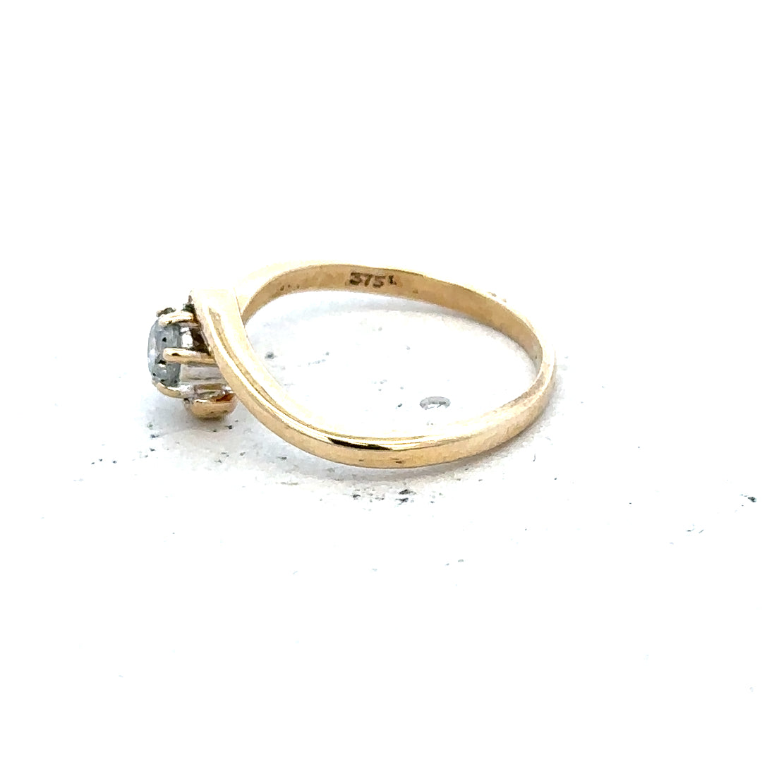 9ct yellow gold diamond ring with a size I 1/2, featuring a delicate design and 1.6g weight, unbranded jewelry.