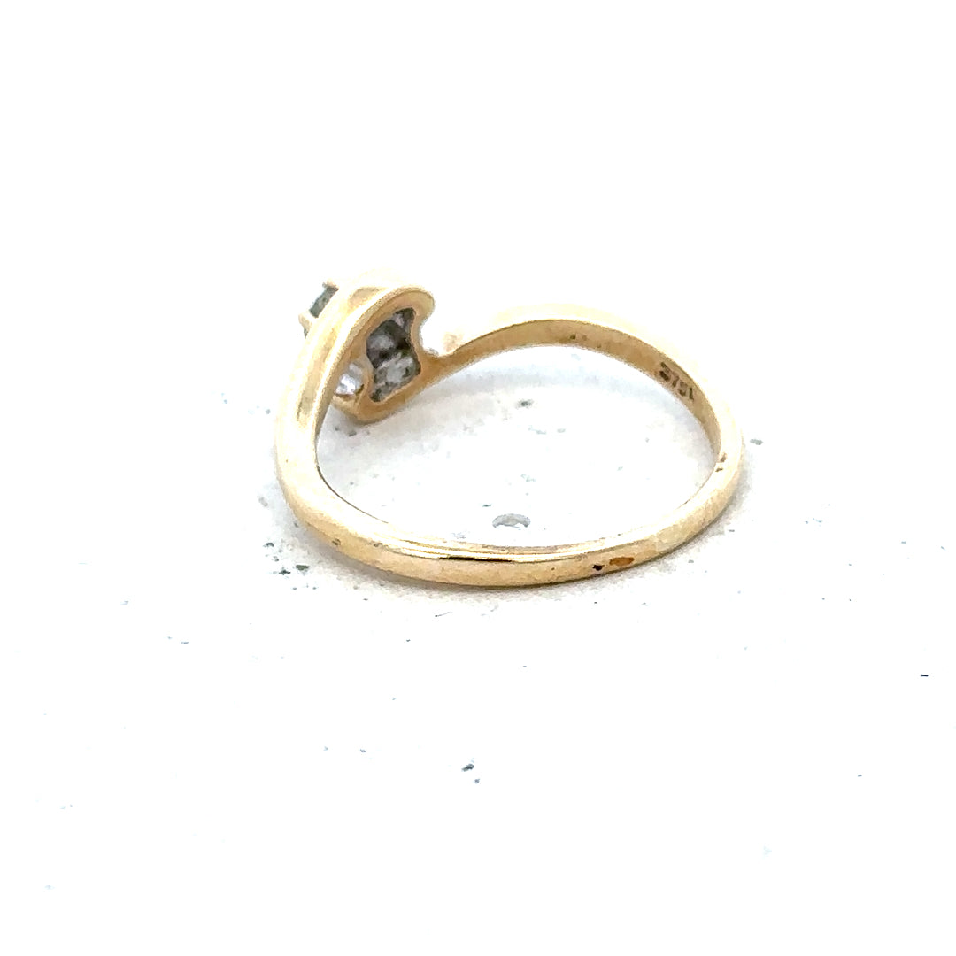 9ct yellow gold diamond ring in size I 1/2 with 1.6g weight, featuring a sparkling diamond centerpiece and a smooth gold band.