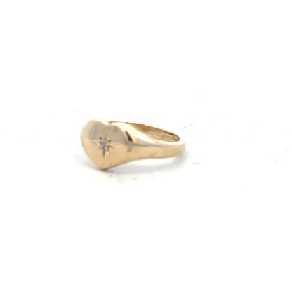 9ct yellow gold diamond ring in size J with sparkling diamonds, unbranded jewelry piece on a white background.