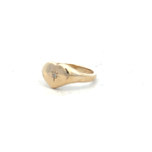 9ct yellow gold diamond ring in size J with sparkling diamonds, unbranded jewelry piece on a white background.