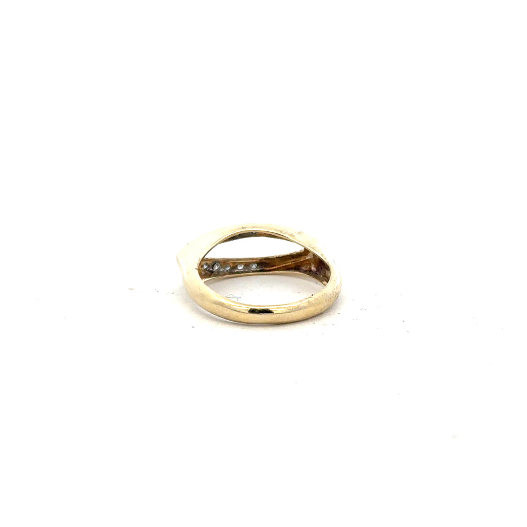 9ct yellow gold diamond ring in size J, featuring a sparkling diamond set on an elegant band.