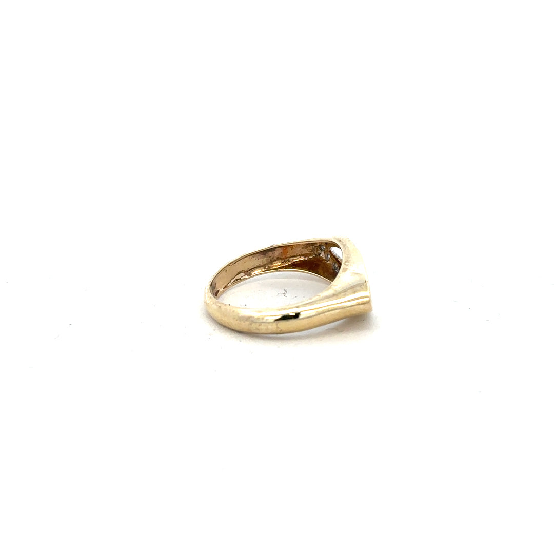 9ct yellow gold diamond ring size J with sparkling diamonds, showcasing a elegant jewelry piece.