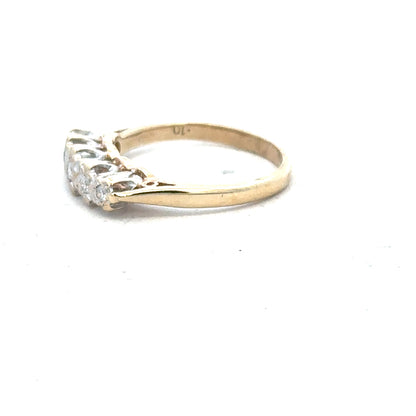 9ct yellow gold diamond ring in size J with sparkling diamonds, elegant jewelry piece with a classic design
