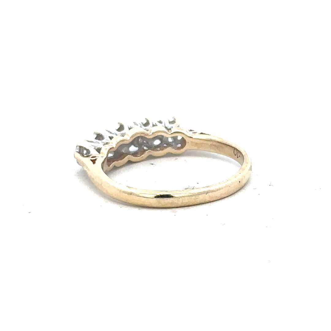 9ct yellow gold diamond ring in size J with sparkling diamonds, featuring an elegant and classic design.
