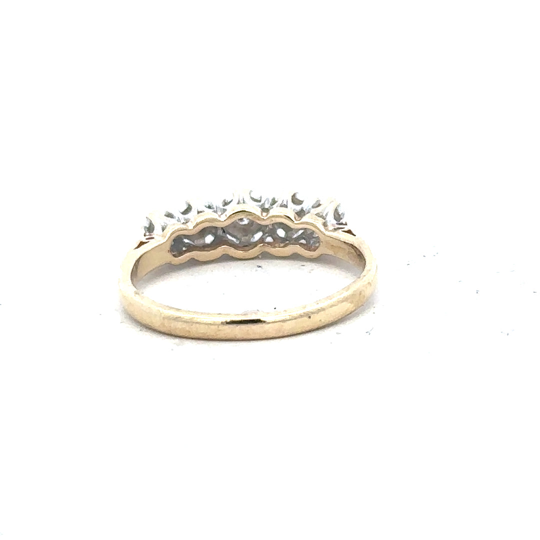 9ct yellow gold diamond ring in size J with sparkling diamonds, showcasing elegant craftsmanship and a classic design.