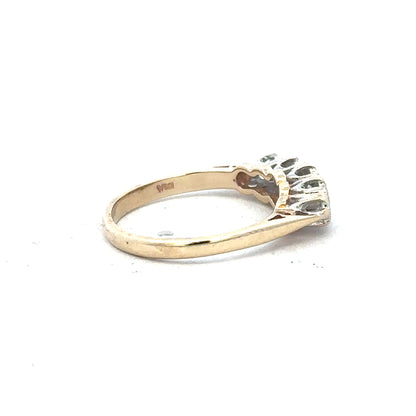 9ct yellow gold diamond ring in size J with sparkling diamonds, showcasing elegant jewelry design and craftsmanship.