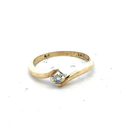 9ct yellow gold diamond ring in size K 1/2 with 2.3g, featuring a sparkling diamond setting.