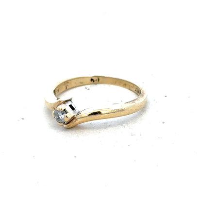 9ct yellow gold diamond ring in size K 1/2 with 2.3g weight, featuring a sparkling diamond setting.