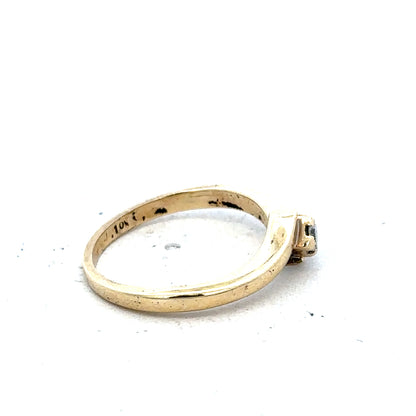 9ct yellow gold diamond ring size K 1/2 with 2.3g weight, showcasing a elegant gemstone setting on a polished gold band.