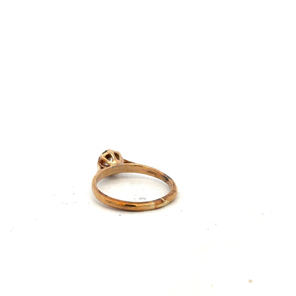 9ct yellow gold diamond ring in size K, featuring a sparkling central diamond and elegant band design.
