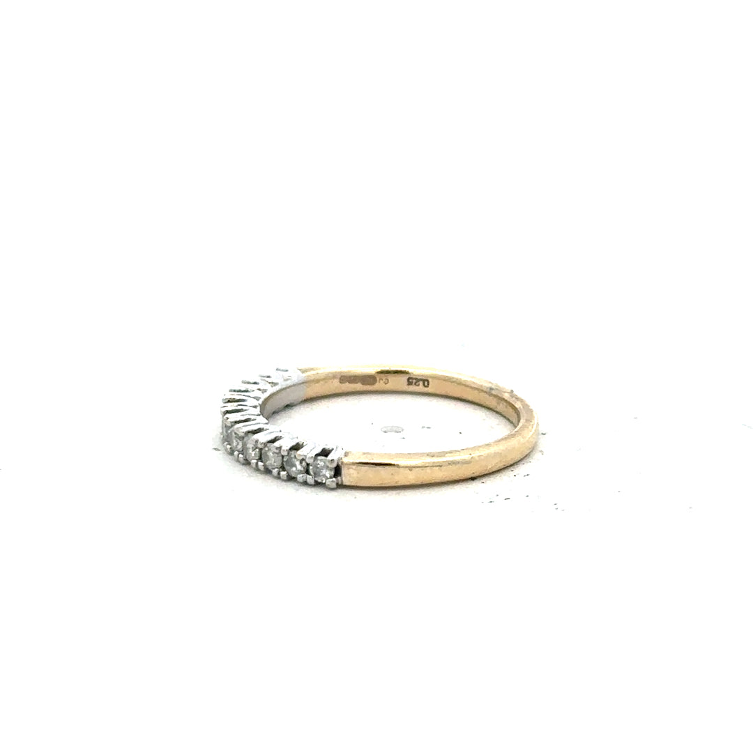 9ct yellow gold diamond ring in size K with sparkling diamonds, unbranded jewelry displayed on a white background.