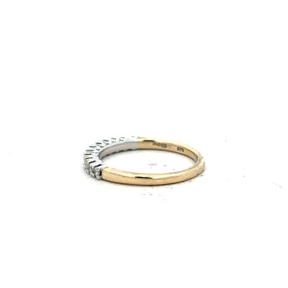 9ct yellow gold diamond ring in size K with a sparkling central diamond, showcasing fine craftsmanship and elegant design.
