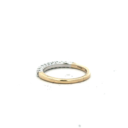9ct yellow gold diamond ring in size K with a sparkling diamond setting, unbranded, showcasing the elegant jewelry design.