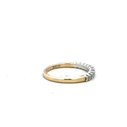 9ct yellow gold diamond ring in size K with sparkling diamonds, showcasing an elegant jewelry design.
